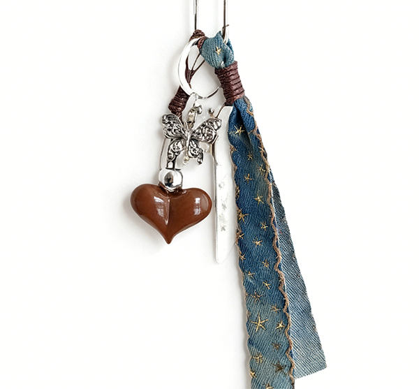 Brown heart-shaped bag decoration